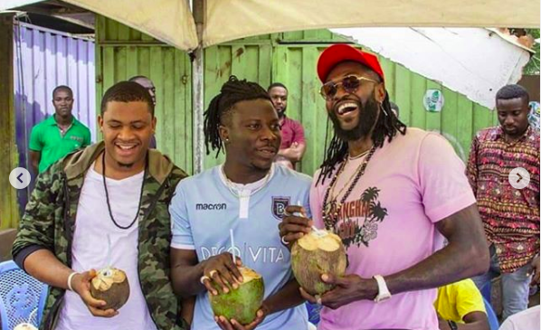 #CoconutFriday: Emmanuel Adebayor, Stonebwoy, others buy GHC2 coconuts for GHC200 & donate huge money to change life of seller  (+Video)