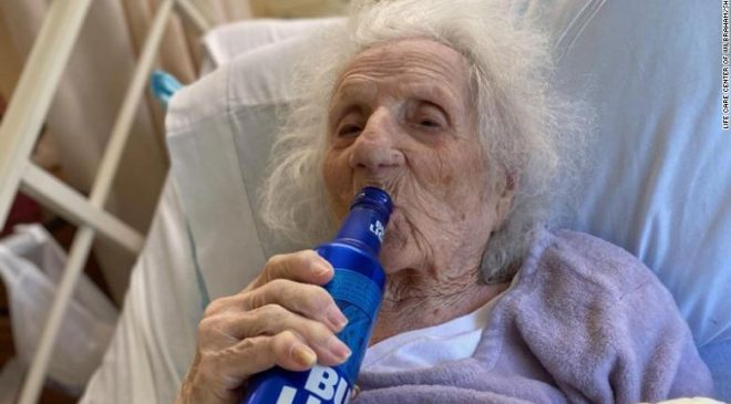 103-year-old woman celebrates beating Covid-19 with a cold beer