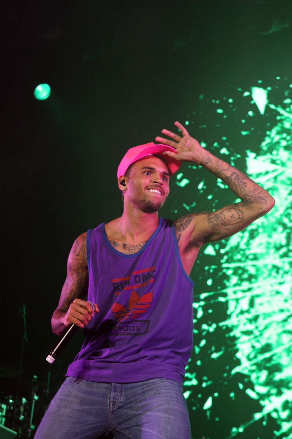 Chris Brown throws fan’s phone into the crowd for filming while on stage