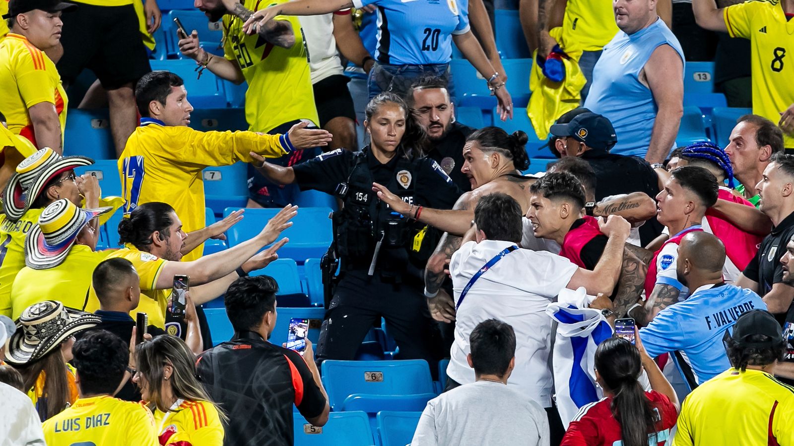 Uruguay players clash with Colombia fans in the stands after a defeat, claiming they were ‘defending’ their families.